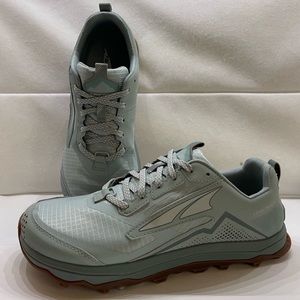 Altras lone peak5 hiking/ trail running shoes. Worn once, too big for me.